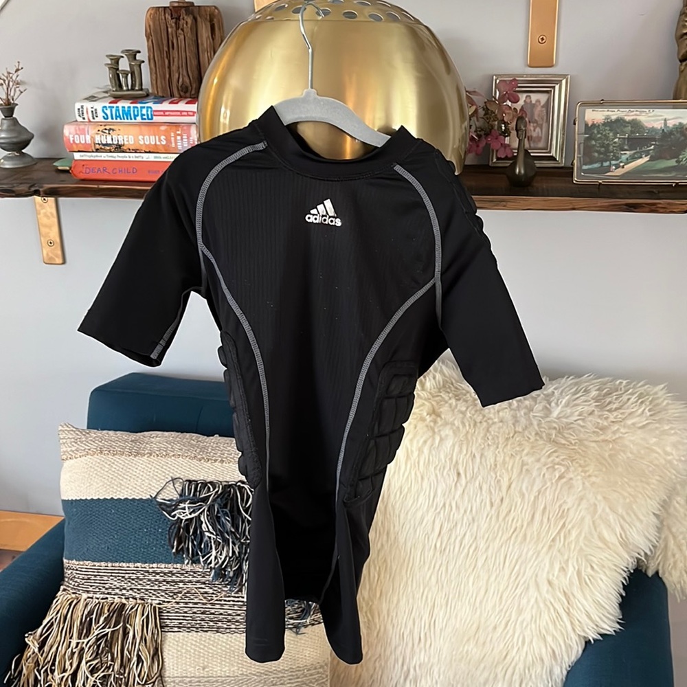 Adidas youth size small padded football shirt